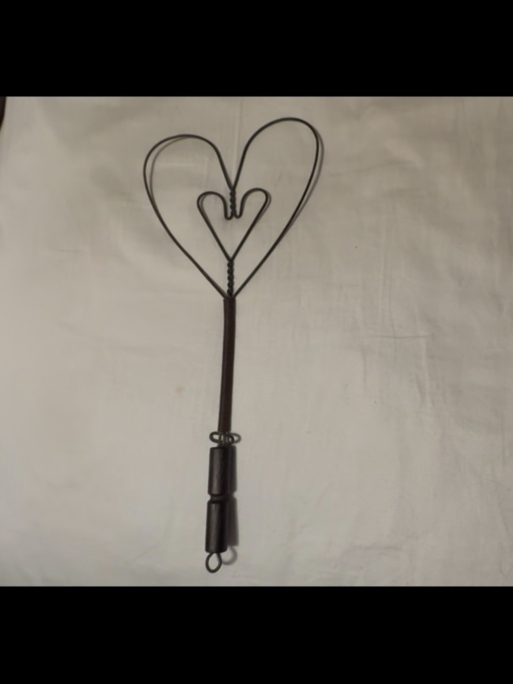 Antique double wire heart shaped rug beater, w/wood handle.